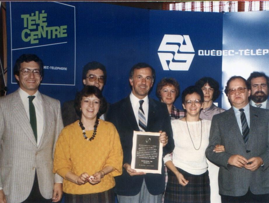 Jean-Marc et son groupe du Marketing au milieu des années 80. Sur la première rangée, il est entouré de Marius Truchon, Thérèse Bouillon, Noëlla Rioux et Raymond Castonguay.